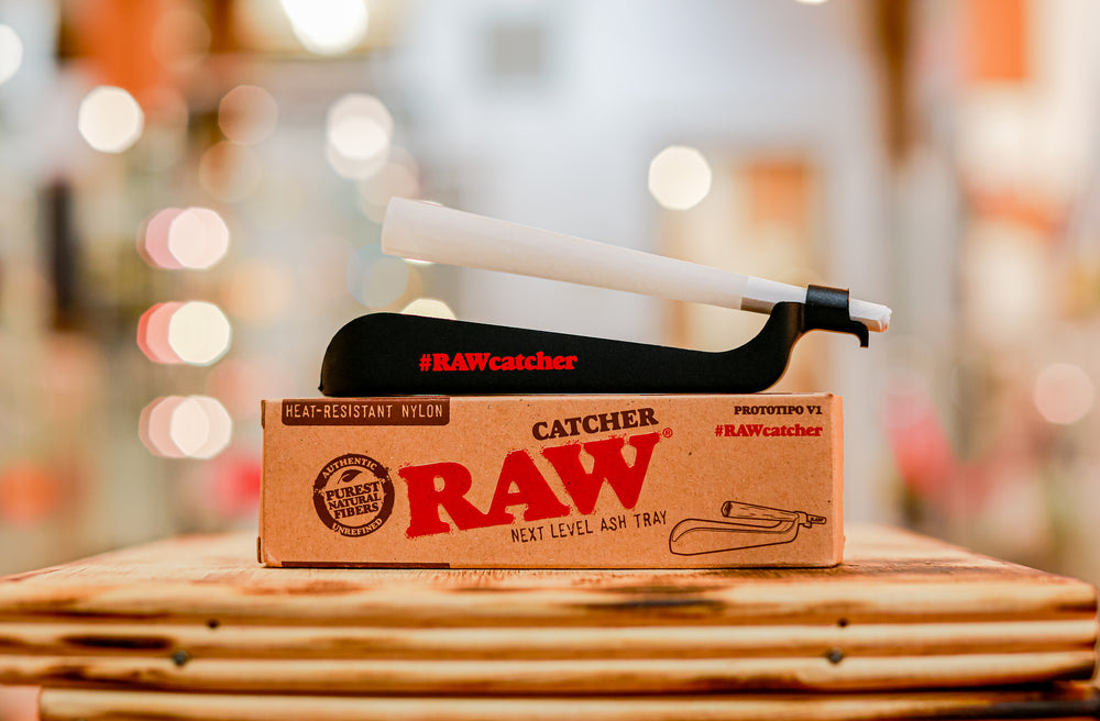 Raw Catcher heat resistant nylon ash tray and joint holder with front of box