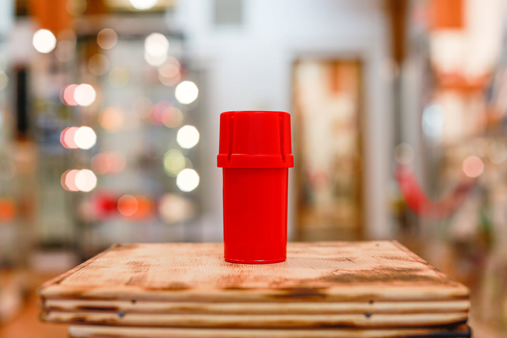 Red Med-Tainer smell proof plastic grinder